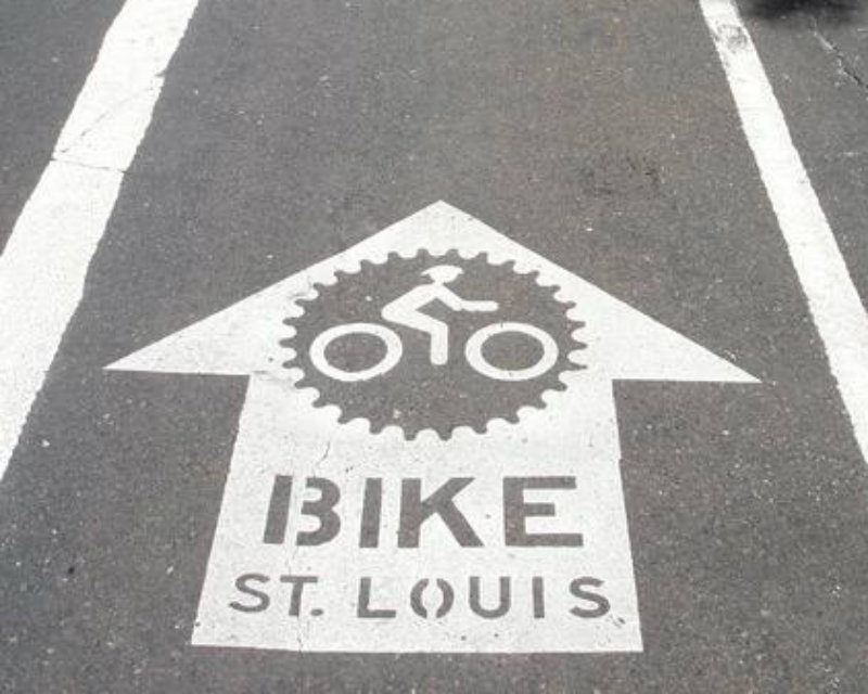 A bike path shows the Bike St. Louis logo